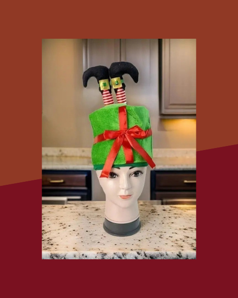 Chapeau Cadeau de Noël avec Jambes de Lutin - photo premium Panoplia